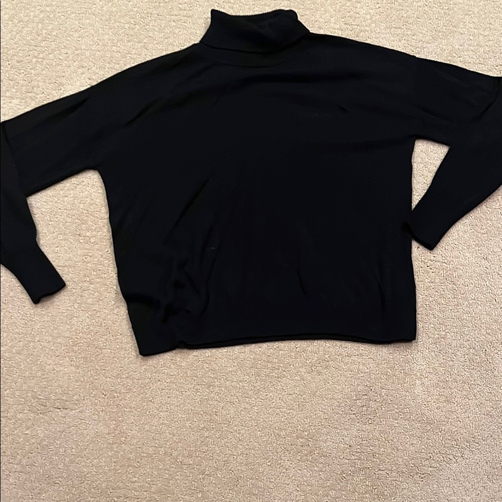 Treasure & Bond size small black turtleneck. Viscose, nylon, polyester and wool.